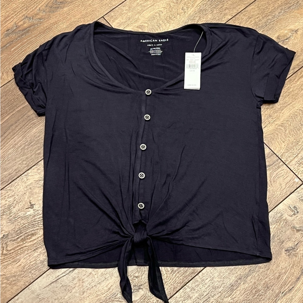 American Eagle Navy Top with tie at bottom .  Size XS.  NWT